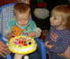 Jared, Christina and his cake.JPG (85890 bytes)