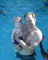 dad and jared in the pool.jpg (27424 bytes)